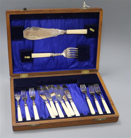 A set of six plated fish knives, forks and servers, cased